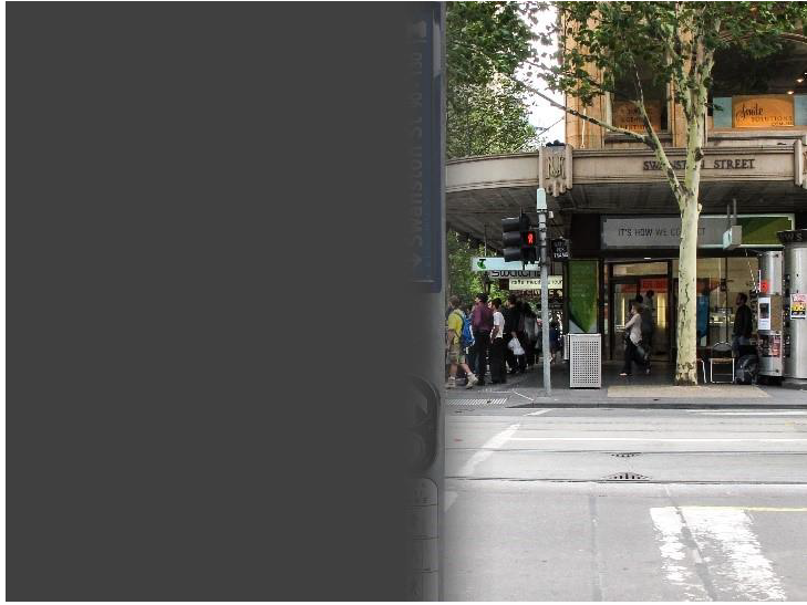 Demonstration of vision impacted by a left hemianopia stroke with a street crossing and sign on a streetscape